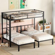 bunk beds with mattresses are shown in this bedroom setting, and the bed frame is made from black metal