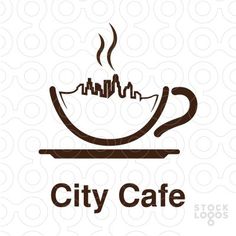 a coffee cup with the words city cafe on it and a skyline in the background