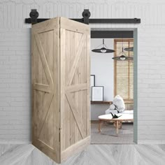 an open wooden door leading to a living room with white brick walls and flooring