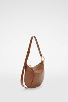 Moon Small - Shoulder bags Designer Saddle Shoulder Bag For Formal Occasions, Designer Formal Saddle Shoulder Bag, Elegant Soft Leather Saddle Shoulder Bag, Elegant Saddle Shaped Soft Leather Shoulder Bag, Small Shoulder Bags, Red Handbag, Brown Shoulder Bag, Black Shoulder Bag, Black Crossbody