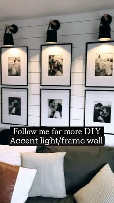 a living room with pictures on the wall and lights hanging above it, along with text that reads follow me for more diy accent light / frame wall