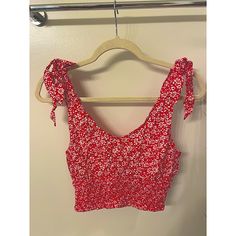 New. Hollister Cropped Floral Top. Ties On Shoulders. New With Tags. Size M. Trendy Red Tank Top For Day Out, Trendy Red Crop Top With Floral Print, Trendy Red Floral Print Crop Top, Navy Blue Crop Top, Hollister Crop Tops, Crop Swim Top, Yellow Crop Top, Cropped Long Sleeve Top, Crop Top Sweatshirt