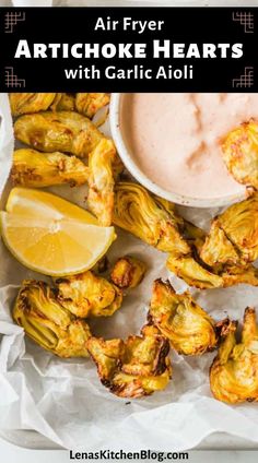 air fryer artichoke hearts with garlic aiolii and dipping sauce on the side