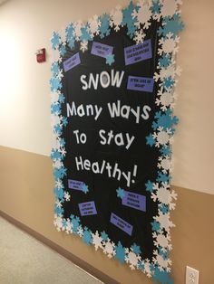 a bulletin board that says snow many ways to stay healthy on the wall in an office