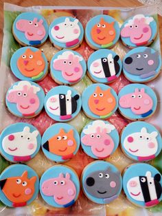 cupcakes decorated with pep the pig and other characters