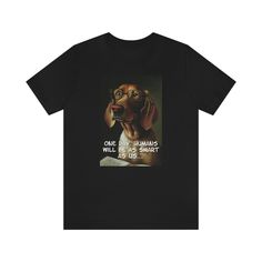 a black t - shirt with an image of a dachshund on it