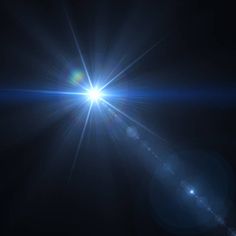 the sun shines brightly in the dark sky with lens flares on its side