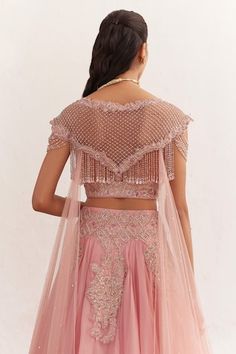 Rose pink attached can-can lehenga featuring floral, prarl, sequin, bead and tassel hand embroidery. Paired with a padded hand embroidered blouse with tassel detailing on the back with attached drape. - Aza Fashions Pink Pearl Embroidered Reception Set, Festive Pink Choli With Pearl Embroidery, Pink Reception Set With Pearl Embroidery, Pink Pearl Embroidered Sets For Reception, Pink Lehenga With Pearl Embroidery For Wedding, Pink Party Choli With Pearl Embroidery, Festive Pink Lehenga With Pearl Embroidery, Pink Pearl Embroidered Lehenga For Festive Occasions, Pink Pearl Embroidered Lehenga For Wedding