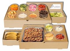 three cardboard boxes filled with different types of food and condiments on top of each box