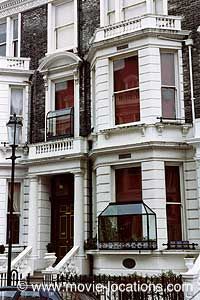 an apartment building with many windows and balconies