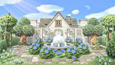 a white dog sitting on top of a fountain in front of a house with blue flowers