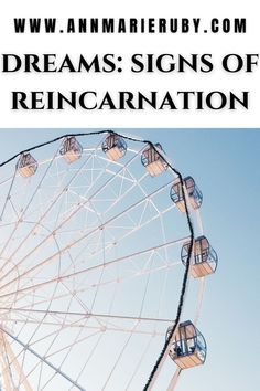 a ferris wheel with the words dreams signs of reincarnation