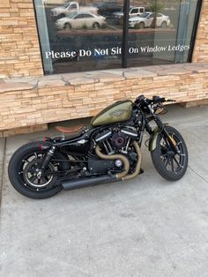 a motorcycle parked in front of a building