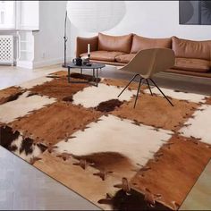 a brown and white rug in a living room