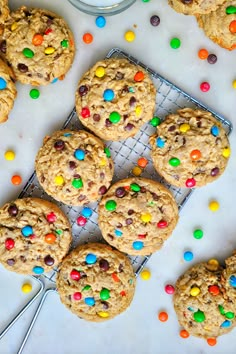 cookies with m & m and chocolate chips on a cooling rack