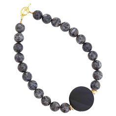 - Vintage item - Collectible jewelry piece from the '80s - 20" length - 20mm smooth and polished black labradorite beads - 1.75" diameter smooth, polished flat circular onyx bead - Gold tone accents - Toggle clasp - Circa 1980s - Estate acquired - Beautiful vintage condition with minimal wear (see photos) Labrador Nero, Black Labradorite, Vintage Beads Necklace, Long Beaded Necklace, Labradorite Beads, Onyx Bead, Beaded Necklaces, Fun Things, Pearl Beads