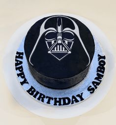 a darth vader birthday cake with the words happy birthday sam written on it