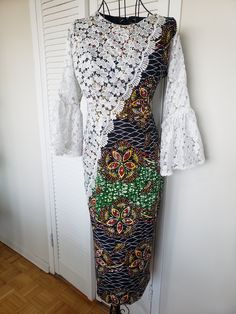 "Actual Measurements: M1:Bust 34/Waist 34/Hip 40/Length 36 L: Bust 36/Waist 34/Hip 42/Length 42 Fabric: Ankara 100% Cotton Very smooth to touch, and cool on the skin.  This Combined Ankara and Lace dress is an excellent addition to your Collection. Custom tailored with you in mind using the finest authentic African Ankara material  popularly known as \"Big Ankara\" I grew up wearing Ankara dresses and I can tell you that Ankara Materials are well known for their vibrant colors and patterns, as a Traditional Fitted Cotton Maxi Dress, Fitted White Dress With Traditional Patterns, White Fitted Dress With Traditional Patterns, Long Sleeve Lace Dress With Patchwork, Fitted Cotton Dresses With Traditional Patterns, White Stretch Bohemian Dress, Fitted Maxi Dress With Traditional Patterns, Fitted Long Sleeve Dresses With Traditional Patterns, Traditional Fitted White Maxi Dress