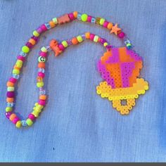 Ring Pop Perler    #rave #ravewear #kandi #perler #musicfestival Kandi Perler, Ring Pop, Rave Wear, Accessories Jewelry Necklace, Women Accessories Jewelry, Music Festival, Women's Accessories, Jewelry Accessories, Jewelry Necklaces