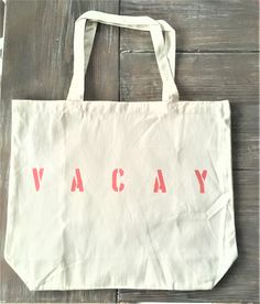 "The VACAY Oversized canvas tote bag is perfect for any adventure! Available with text in several colors... check out the variations! This bag is made from 100% thick, sturdy canvas. AVAILABLE IN TWO SIZES * Large - 19.5\" x 13\" with a 4\" gusset *Jumbo - 23\" x 13\" with a 6\" gusset These bags are hand painted using non-toxic fabric paint. The technique used creates an attractive distressed appearance to the text that varies from bag to bag. All of my products are made to order. Production ti Large Capacity Canvas Tote Bag For Vacation, Rectangular Canvas Bag For Everyday Vacation Use, Rectangular Canvas Bag For Everyday And Vacation, Cotton Weekender Bag For Everyday Summer Use, Summer Cotton Weekender Bag For Everyday, Summer Travel Tote Canvas Bag, Summer Canvas Tote Bag For Travel, Travel Cotton Tote Beach Bag, Travel Tote Canvas Bag For Vacation