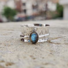 WELCOME : SILVERRINGSTORESHOP Labradorite Ring, Spinner Ring, 925 Silver Ring, Women Ring, Boho Ring, Natural Stone, Gemstone Ring, Fidget Ring,Thumb Ring, Gift For Fer, 925 Sterling Silver Spinner Ring ( Metal Stamp : 925 ) Metal Stamp : 925 Sterling Silver Ring Size : All sizes are available Half sizes are also available. This Beautiful Jewelry will make you the center of attraction wherever you go. Wear it on any occasion. You are assured of flawless appearance. Silver Sterling Stackable Rings With Natural Stones, Silver Birthstone Ring With Natural Stones For Anniversary, Silver Stackable Rings With Natural Stones, Silver Wide Band Jewelry With Gemstone, Silver Wide-band Jewelry With Gemstones, Silver Birthstone Ring With Natural Stones For Promise, Silver Labradorite Rings For Anniversary, Silver Open Ring With Natural Stones, Silver Labradorite Ring Stamped 925