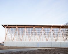 DLW-architectes, Francois Dantart · Waste, recyling and repair centre Building Skin, Wooden Facade, Arch Architecture, Sports Center, Timber Buildings, Wood Architecture, Industrial Architecture, Timber Structure