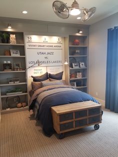 a bed sitting in the middle of a bedroom next to a book shelf