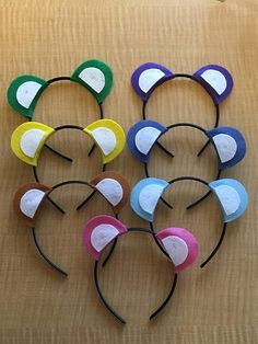 four mouse ears with different colors and shapes