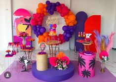 a birthday party with balloons and decorations