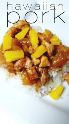 a white plate topped with rice covered in meat and pineapples on top of it