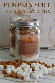 pumpkin spice hot chocolate mix in a jar with marshmallows on the side