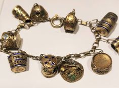 Fine Vintage 800 Silver Gold Plate Charm Bracelet, 1920s Hard Enamel Antique European Bijoux Femme Gifts Beautifully crafted Continental 800 Silver and gold vermeil charm bracelet is Circa 1920 and likely Portuguese in origin.  Surprisingly understated, this European bracelet has gorgeous blue and green enamel in excellent condition. The sophisticated 'vintage lifestyle' bracelet is 7" inches (17.5cm) long and features 10 representative charms of European lives in the 1920s. The hanging symbols 1920s Christmas, Sister Christmas, Wearable Art Jewelry, Gift Sister, Vintage Chain, Bracelet Boho, Boho Gifts, American Jewelry, Christmas Gifts For Her