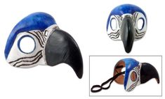 two masks with different designs on them, one is blue and the other is black