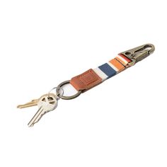 an orange, white and blue striped keychain with two keys on each side