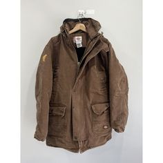 Vintage Dickies hooded jacket. Size XL fit. Paint stain on shoulder. Measurments below. Good overall condition. May need light wash LENGTH -- 32 inches PIT TO PIT -- 27 inches SLEEVE LENGTH -- 19 inches *PLEASE NOTE ALL MY ITEMS MAY CONTAIN UNMENTIONED FLAWS SUCH AS HOLES RIPS AND STAINS* All sales final. I do bundle deals as well Retro Brown Hooded Outerwear, Vintage Brown Hooded Jacket With Pockets, Vintage Hooded Parka With Pockets, Vintage Brown Long Sleeve Hooded Jacket, Vintage Hooded Hunting Outerwear, Paint Stain, Hooded Jacket, Overalls, Work Wear