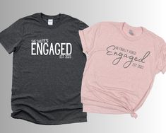 "Newly Engaged Couple Matching T-shirts NO VINYL, NO HEAT TRANSFERS, NO DECALS.  This item is printed with DTG technique, which means graphics are printed directly onto the fabric. No peeling, cracking or fading.  *Lady's V-Neck T-shirt Details * (SHIPS FROM CANADA- 3-5 business days longer shipping time) **DESERT ROSE not Available in V-neck --ATC 8001L Eurospun Ring-Spun Ladies V-Neck T-Shirt --6.8 oz, 100% combed ring-spun cotton --Regular fit --XS - 4XL Adult Unisex Softstyle Crew Neck T-shirt Details (sizes S-3XL) --Gildan 64000 Softstyle Unisex T-Shirt --5.3 oz, 100% pre-shrunk ring-spun cotton --Regular fit --S - 3XL Adult Unisex Heavy-weight Crew Neck T-shirt Details (sizes 4x-5x) --Gildan 5000 Heavy Cotton Unisex T-Shirt --5.3 oz, 100% pre-shrunk cotton --Regular fit --4XL- 5XL HO Matching Tshirts, Party T Shirts, Engaged Shirts, Newly Engaged Couple, Matching Couple Shirts, Engagement Announcement, Couple Tshirts, Newly Engaged, Couple Matching