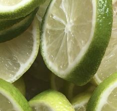 limes are cut in half and stacked on top of each other