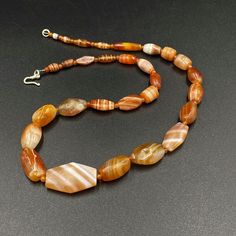 This Necklace is my old collection from Many years A Superb collection of museum quality Greek's Bactrian times Banded Agate Beads with natural Lines from Central Asia Afghanistan Greco Bactrian 256-125 BC Rare and unique collections this beads were used by the Rich Noble people of that time good items for collections and study we provide fast and free shipping service world wide Noble People, Natural Line, Carnelian Beads, Color Bands, Banded Agate, Agate Necklace, Central Asia, Old Antiques, Agate Beads