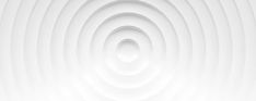 an abstract white background with circles in the center