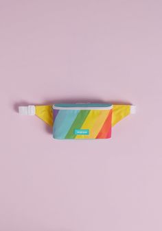 Show off your love for rainbows in true vintage-inspired flair by rockin’ this ModCloth-exclusive rainbow stripe fanny pack ! Featuring an adjustable webbed belt in bright white with a purple plastic clasp closure, this zip-front pouch bag is made from a smooth and durable weave, and is roomy enough to hold all of your daily essentials. Polyester. Zipper closure. Imported Measures 10 x 6 x 2.75 inches. Adjustable strap with push lock closure. | ModCloth Rad Rainbow Stripe Fanny Pack in Rainbow S Vintage Spring Outfits, Rainbow Outfit, Vintage Swimwear, Yellow Knit, Rainbow Shop, Unique Gifts For Women, Vintage Spring, Flamingo Print, Quirky Gifts