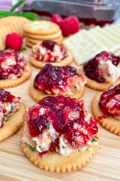 small crackers with jelly and cheese on them