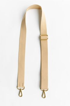 ​Update your favorite bag (or customize a new one) with this crossbody webbing strap. With its adjustable length and convenient clips, it's super easy to swap in and out in two seconds flat—so you can match it with your outfit, your mood, whatever. ​ ​100% nylon webbing that is soft and is built to last along all your adventures.​ ​The brass sliders ensure easy length adjustment for customers of all heights and offers the option to wear it crossbody or simply on the shoulder. Depending on your m Trendy Beige Adjustable Bag Strap, Beige Rectangular Bag Strap With Adjustable Strap, Adjustable Beige Bag Strap, Beige Rectangular Adjustable Bag Strap, Pink Guitar Strap, Signature Collection, Guitar Strap, Wallet Accessories, Medium Bags