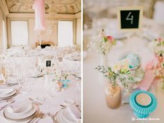 the table is set with white plates and pink flowers in vases, and there are also place settings on the tables