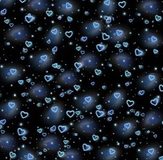 many blue hearts floating in the air on a black background with stars and sparkles