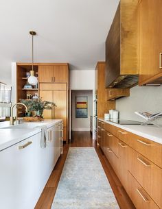 the kitchen is clean and ready for us to use it's counters, cabinets, and drawers