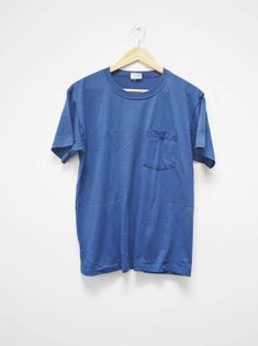 Plain Blue Watson's Tshirt Medium Blue Plain Chest - Etsy Affordable Blue Fan Apparel Shirt, Blue Crew Neck T-shirt With Pockets, Classic Blue T-shirt For Streetwear, Blue Pre-shrunk T-shirt For Everyday, Blue Vintage T-shirt With Relaxed Fit, Blue T-shirt With Pockets And Short Sleeves, Vintage Washed Blue Crew Neck Top, Vintage Short Sleeve T-shirt For Everyday, Blue Casual Pre-washed Shirt