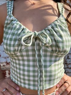 Sage gingham knit crop top Front tie detail Elastic/stretch material Super comfortable! 62% Polyester/24% Rayon/4% Spandex Made in USA Cheap Sleeveless Gingham Tops, Cheap Retro Gingham Tops, Dress Patterns Diy, Gingham Top, Gingham Tops, Summer 24, Blue Gingham, Knit Crop Top, Knit Crop