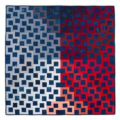 a blue and red quilt with squares on it