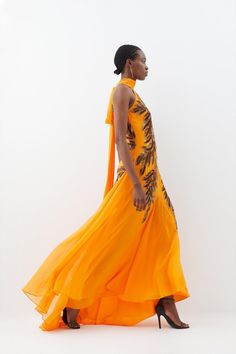 Mesmerise With The Vibrant Depth Of This Maxi Dress, Taking Cues From Movie Theatertic Styles With A Fluted Skirt That Flows With Captivating Depth, Offsetting The Ornate Sequin Feathers That Trace The Halterneck Bodice. This Cascading Piece Calls For Sleek Hair, Gold-Tone Jewels, And Metallic Stilettos To Offset The Artful Embellishments.Halter Necklinesleeveless Bodicesequin Embellishmentsmaxi Length Latest Maxi Dresses, Sleek Hair, Ibiza Outfits, Maxi Dress Collection, Open Back Maxi Dress, Mother Of The Bride Outfit, Garden Party Dress, Evening Dresses Cocktail, Paris Outfits