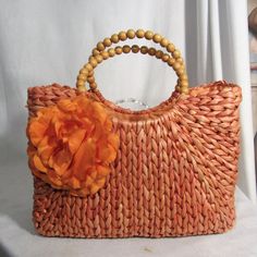 It Has That Handmade Look , Vintage But Never Used. Store Display. 14 X 10 X 5.5 Double Round Wood Bead Handles Corn Straw With Cotton Lining. Orange Summer Bag For Gift, Spring Orange Bags With Braided Handles, Rectangular Orange Straw Bag With Handles, Elegant Summer Orange Bag, Elegant Orange Summer Bag, Rectangular Orange Straw Shopping Bag, Orange Rectangular Straw Shopping Bag, Bohemian Orange Straw Bag, Orange Gift Bag For Summer